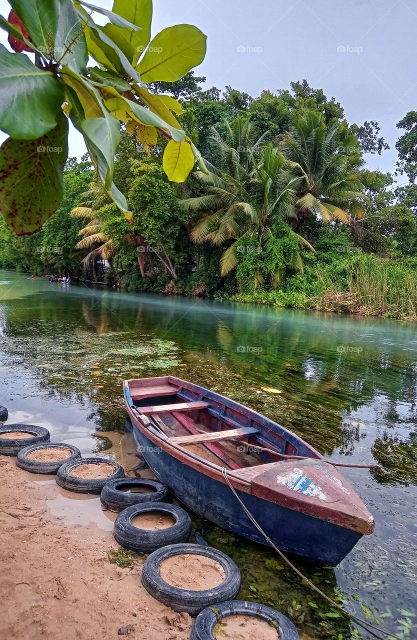 boat by tropical beach