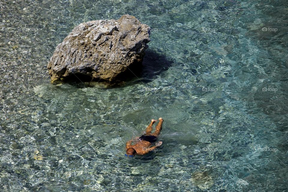 Diving in clear blue waters