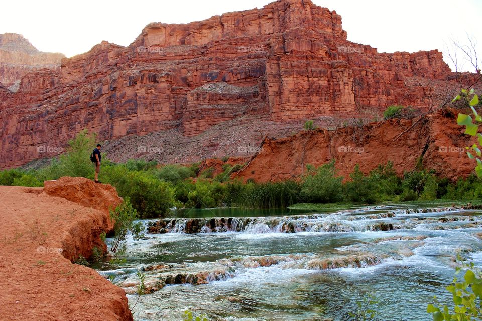 Overlooking the blue green waters of Havasu Creek in the bottom of the Grand Canyon