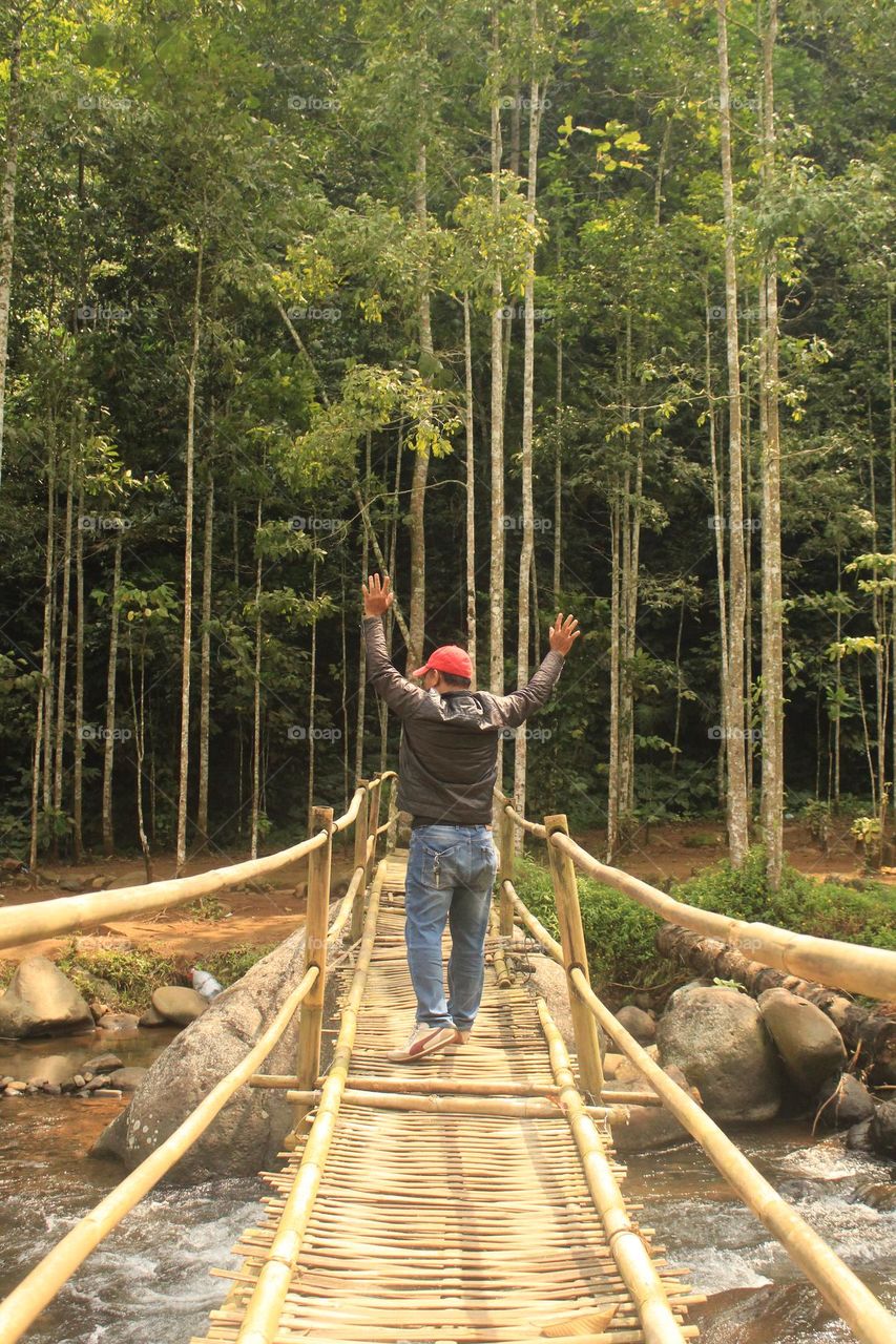 over the bamboo bridge