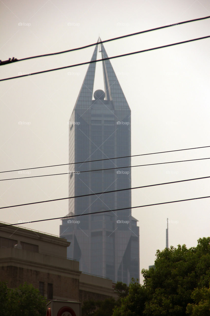 sauron in shanghai. A building that looks like the eye of sauron in shanghai, china.