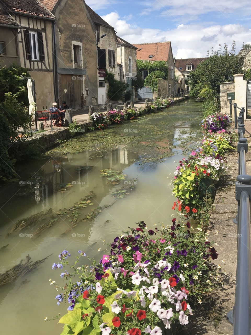 Cool river crossing French village with terrace for chilling outdoors 