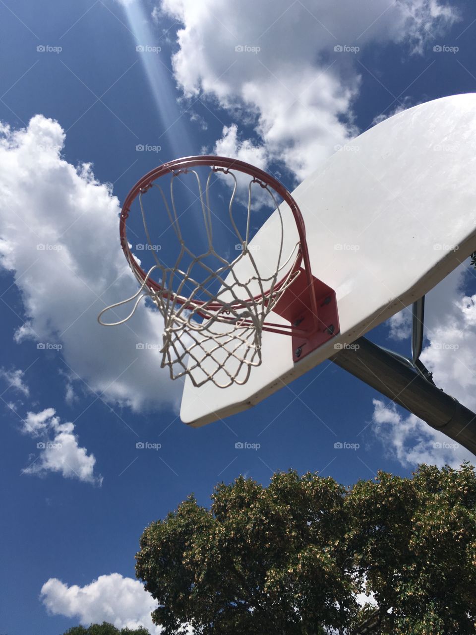 Light Shooting into a Basketball Net 1