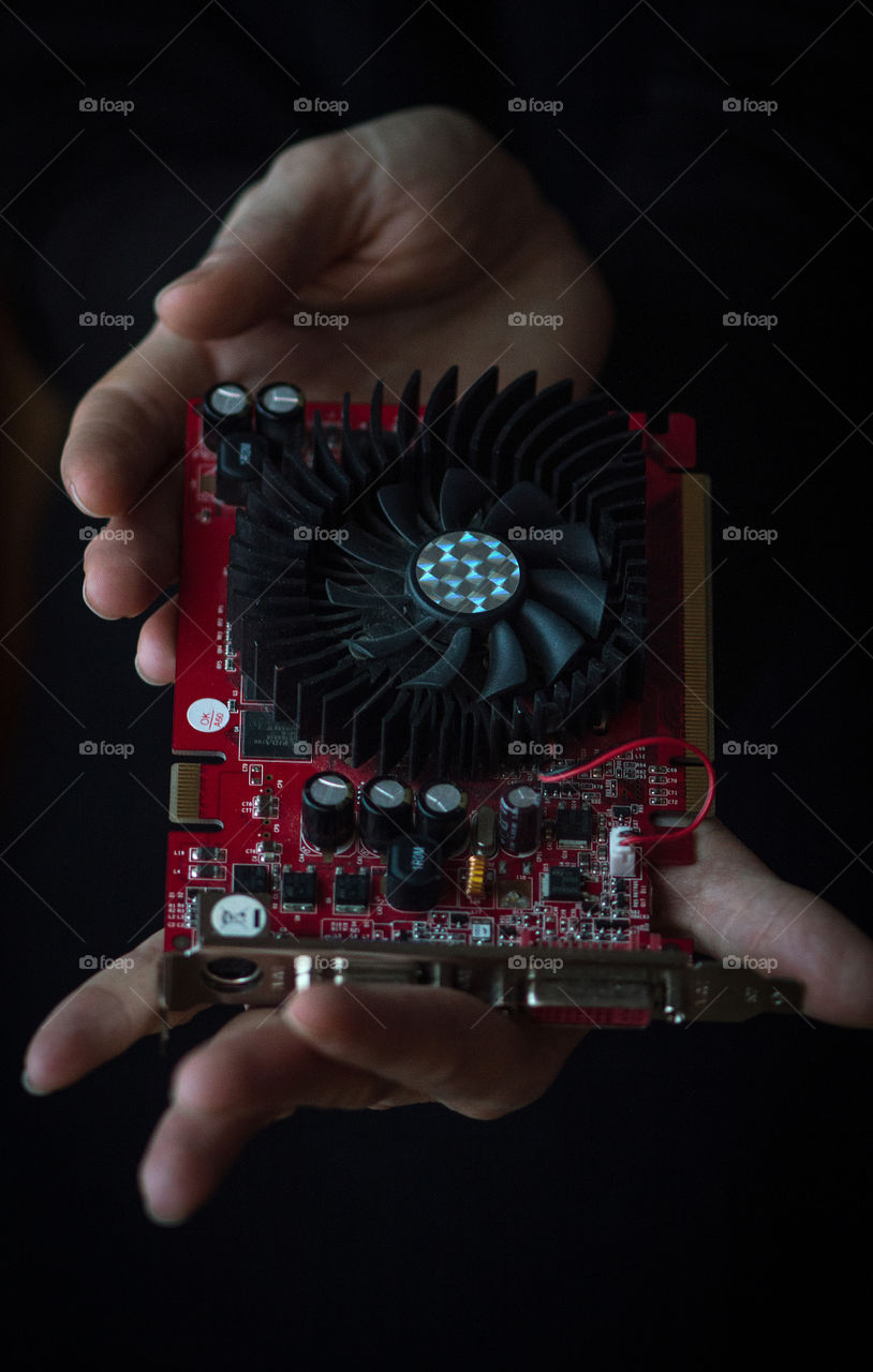 High tech video card in human hands