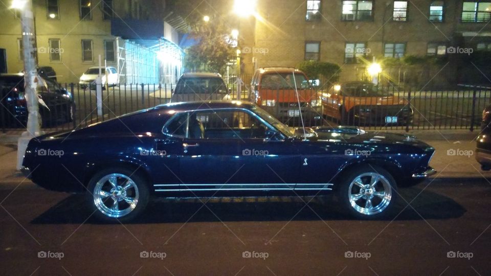 Blue Mustang. Walking back to my car from artichoke pizza, I saw this old suped up blue Mustang,  so I had to take a picture. 