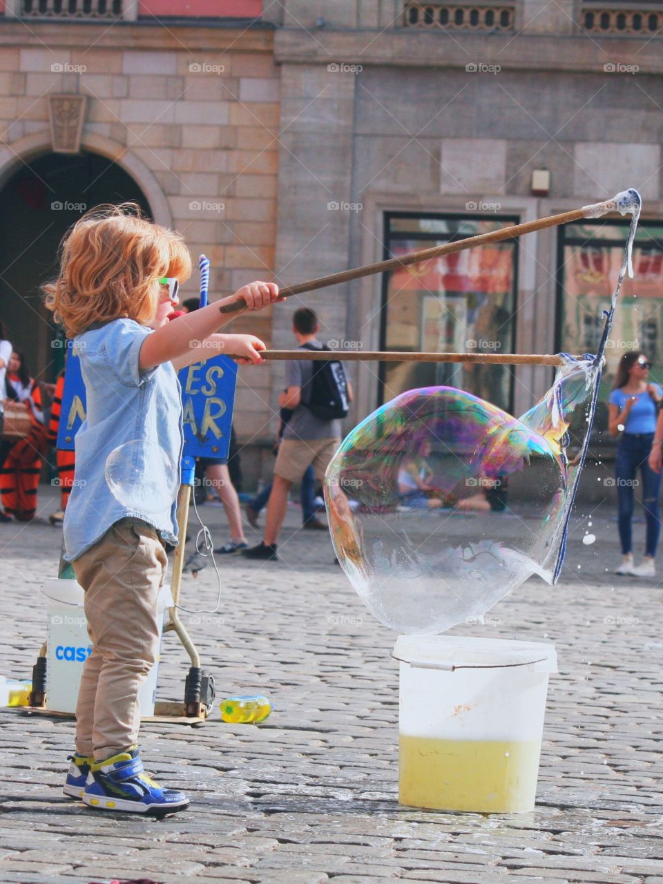Meet a little bubble master! This boy is really talented.