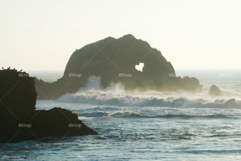 Heart on the rock in ocean 