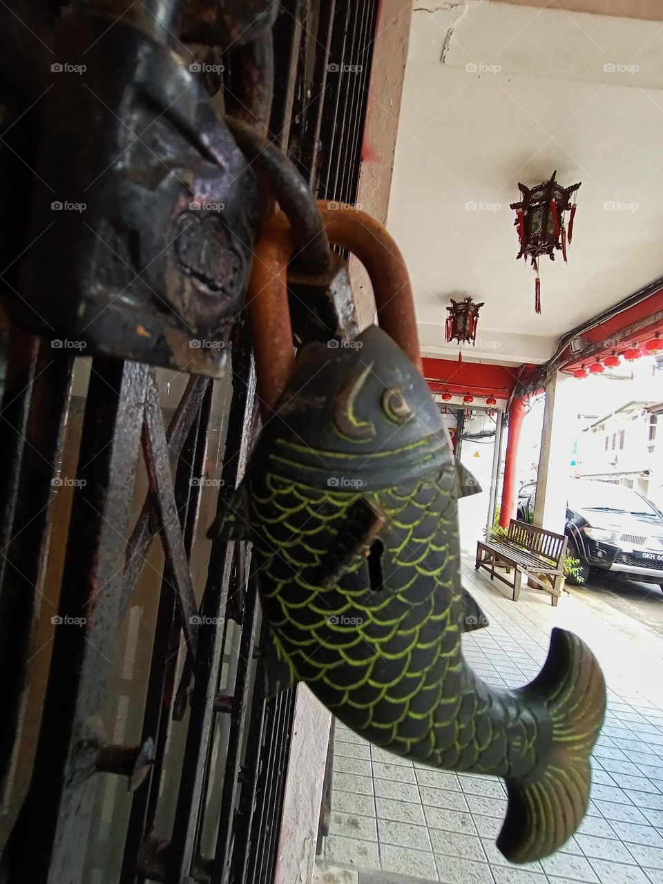 Antique style fish type padlock