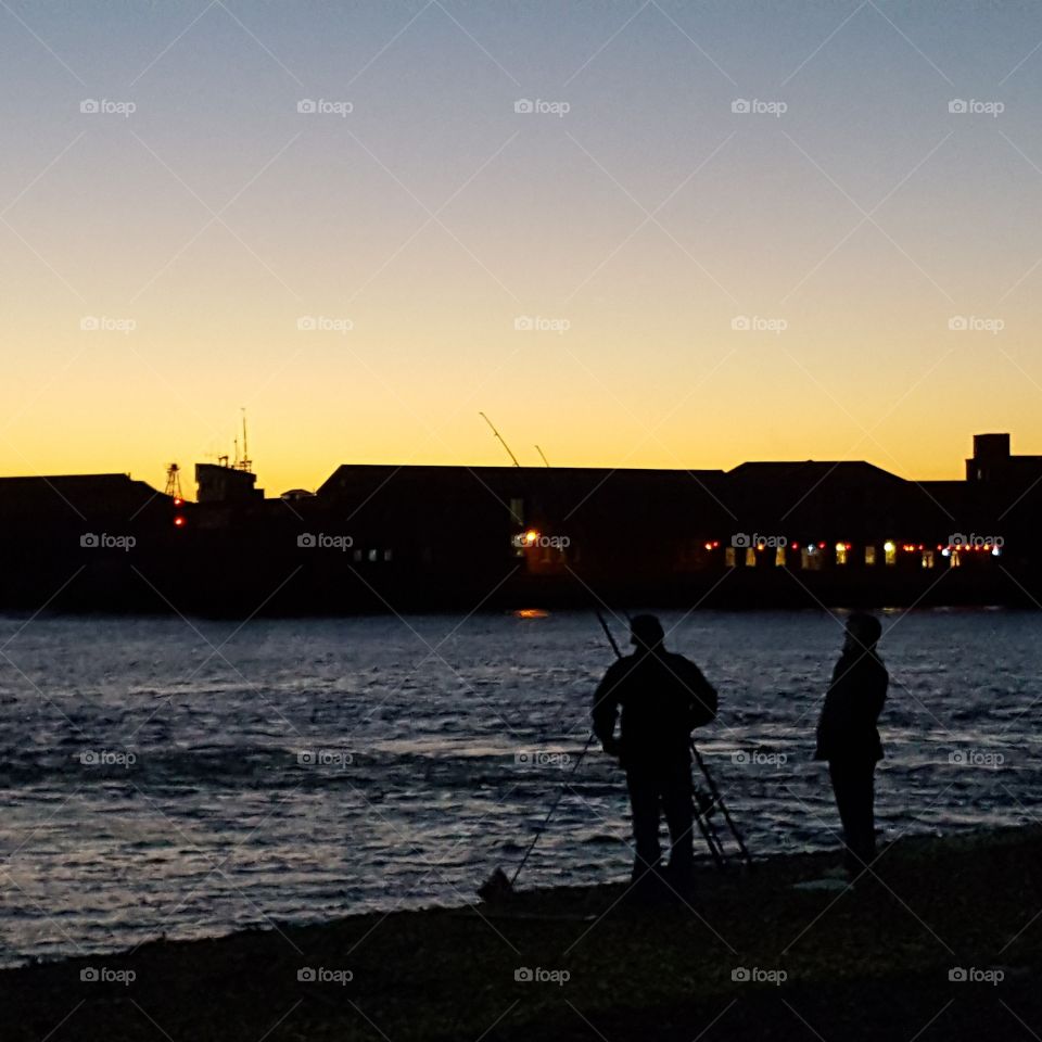 Fishing into the night. Spotted on Southsea Seafront.  England.