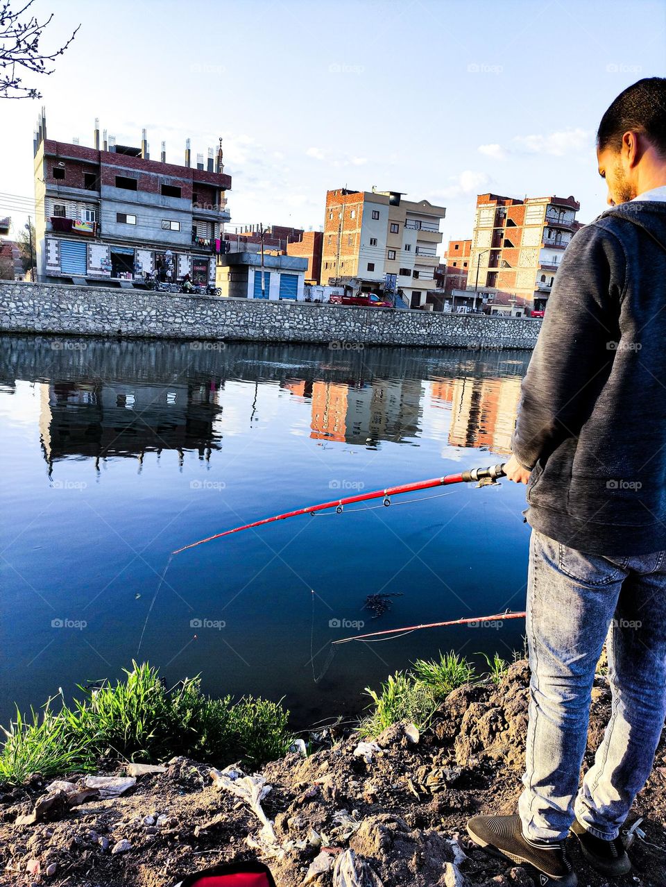 man trying to catch fish