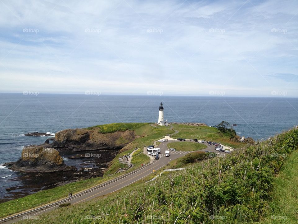 Yaquina Head Lighthouse . Taken from up on the hill behind the lighthouse.