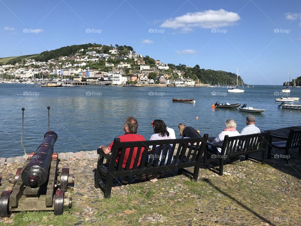 A number of visitors enjoy the super sunshine and the spectacular scenery of Dartmouth.