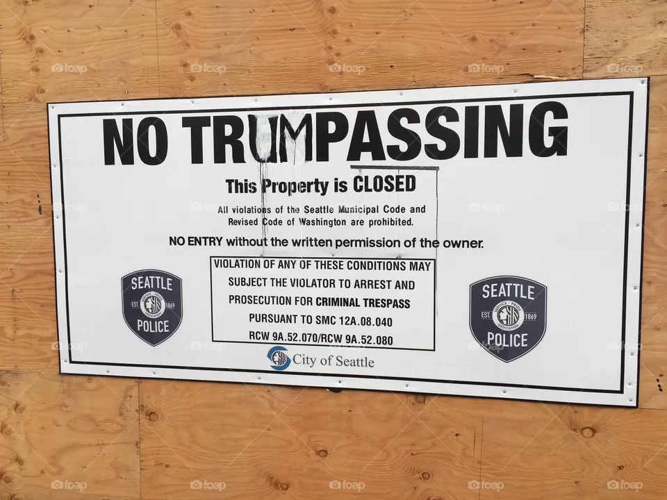 A no trespassing sign vandalized in Seattle to mock Donald Trump.