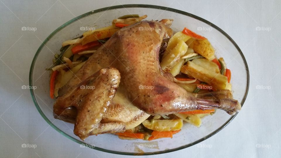 Chicken meat with potatoes and vegetables