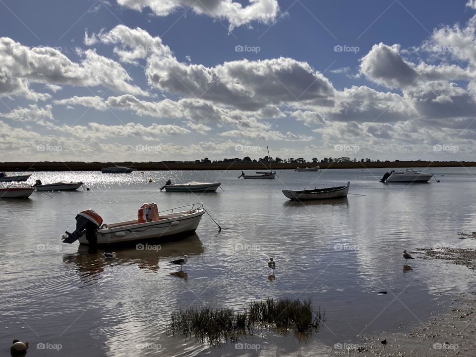 Boats and clouds on Ria Formosa