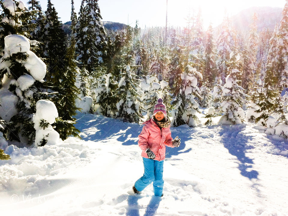 My youngest daughter playing in the snow next to the snowshoeing & cross country skiing trails on a beautiful sunny but brisk day. 