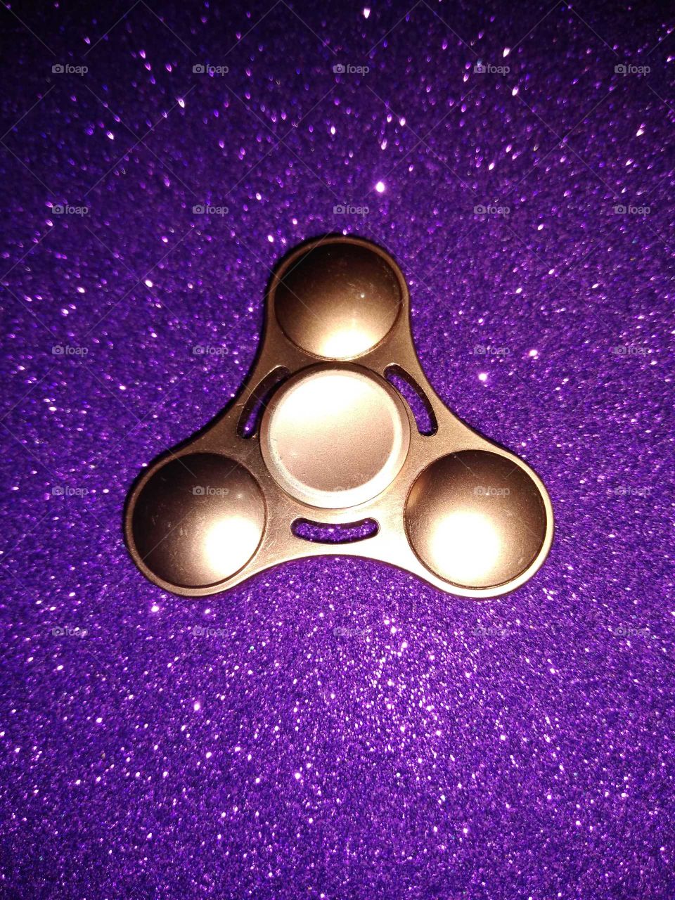 a copper fidget spinner