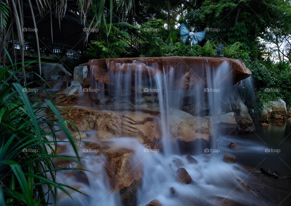Beautiful Artificial rock waterfall @ Resorts world Sentosa.