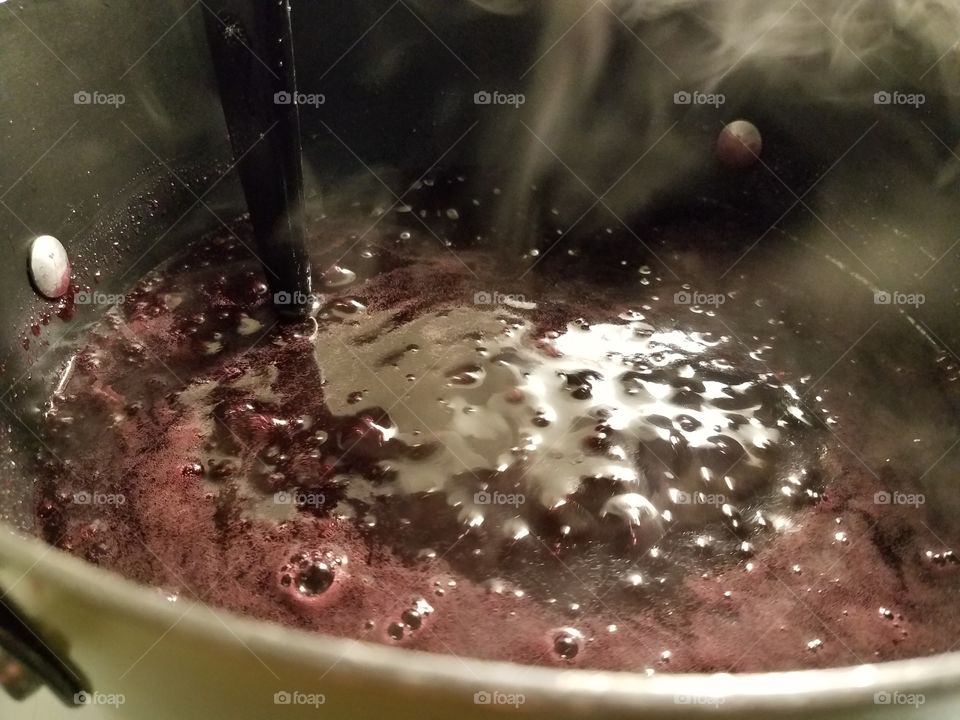 Cooking the grapes to make my grape jelly.