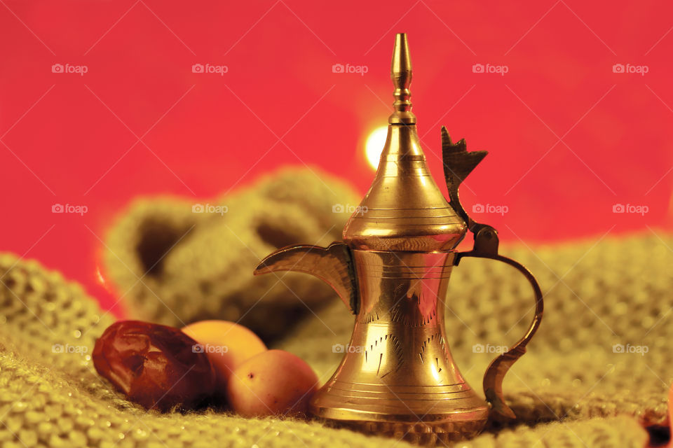 Ramadan Eid Celebration coffee tea golden Dallah with date fruit