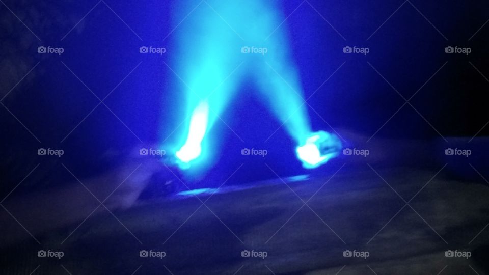 child playing with nighttime led light