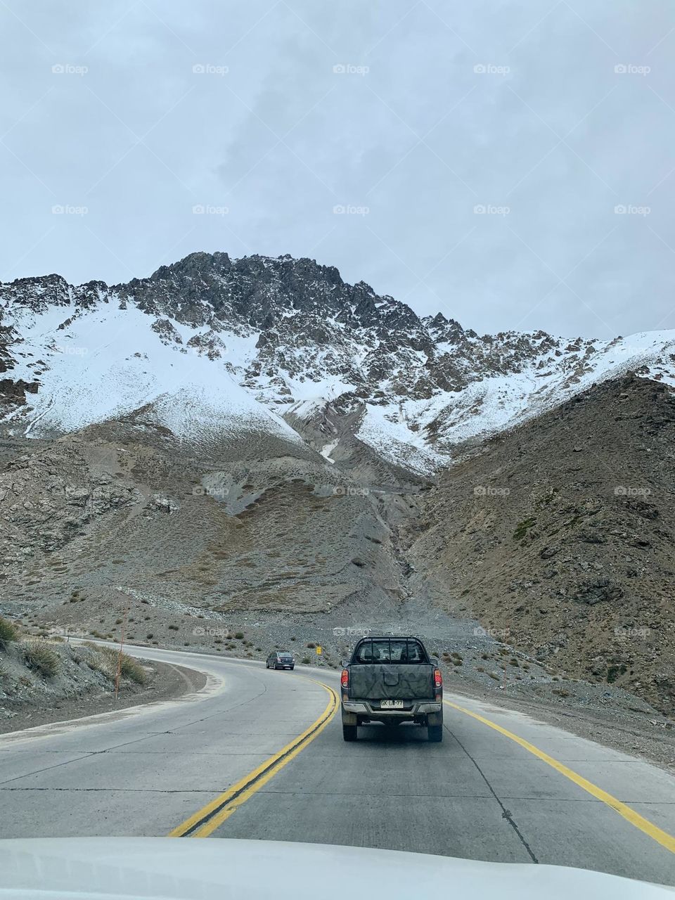 Road with a view of the Alps