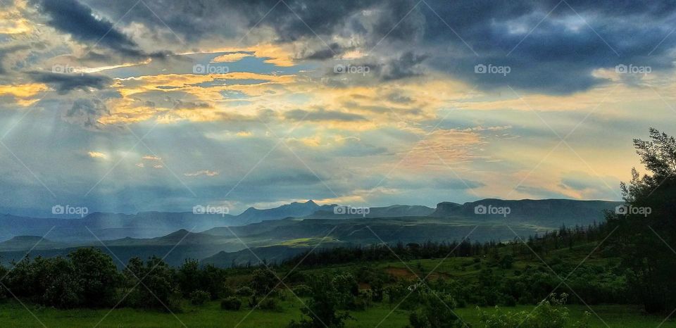 sunshine breaking through the clouds.