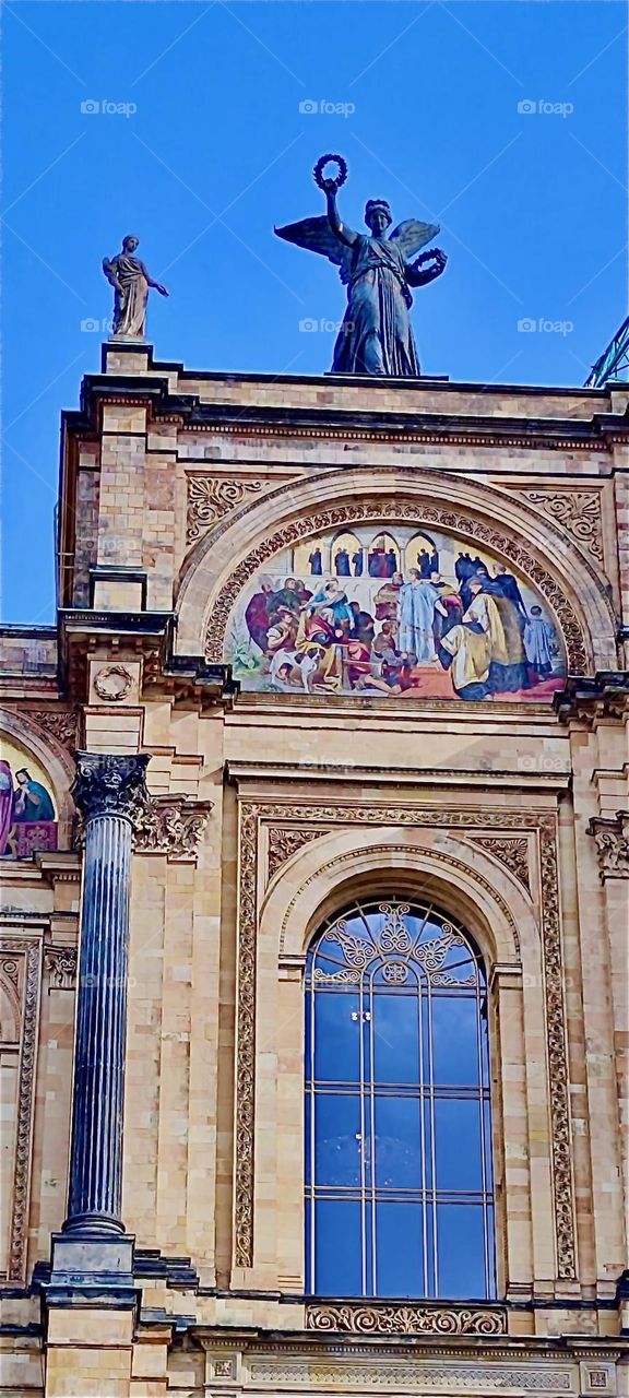 “Endowment of Ettal Monastery by Emperor Ludwig IV” is the title of the center mosaic of the “Maximilianeum” in “Munich”, seat of the “Bavarian State Parliament”. It gives testimony to the Christian faith of “Bavaria”. 2024. Hypnotic Productions