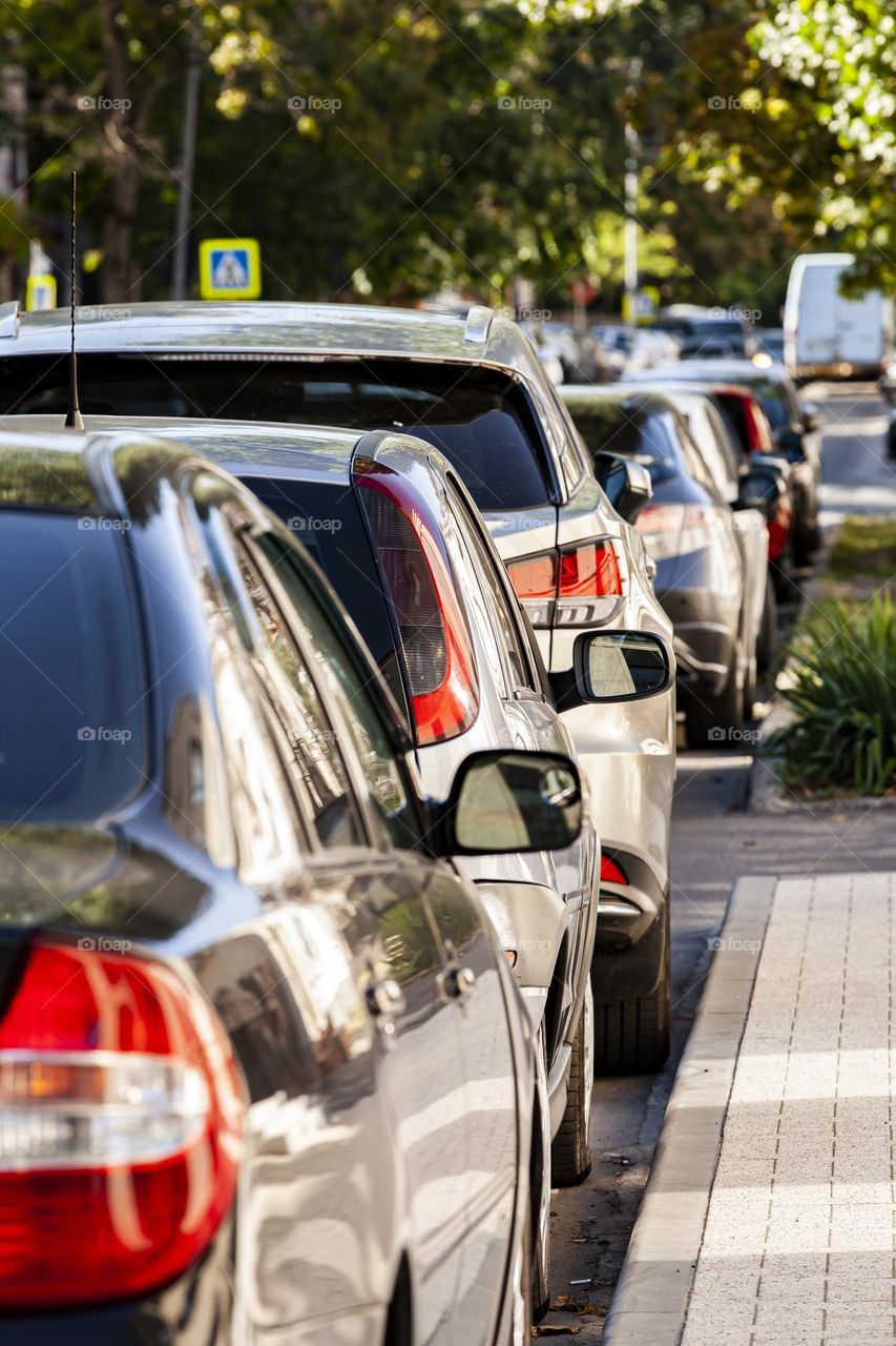 Cars parked on the edge of the roadway