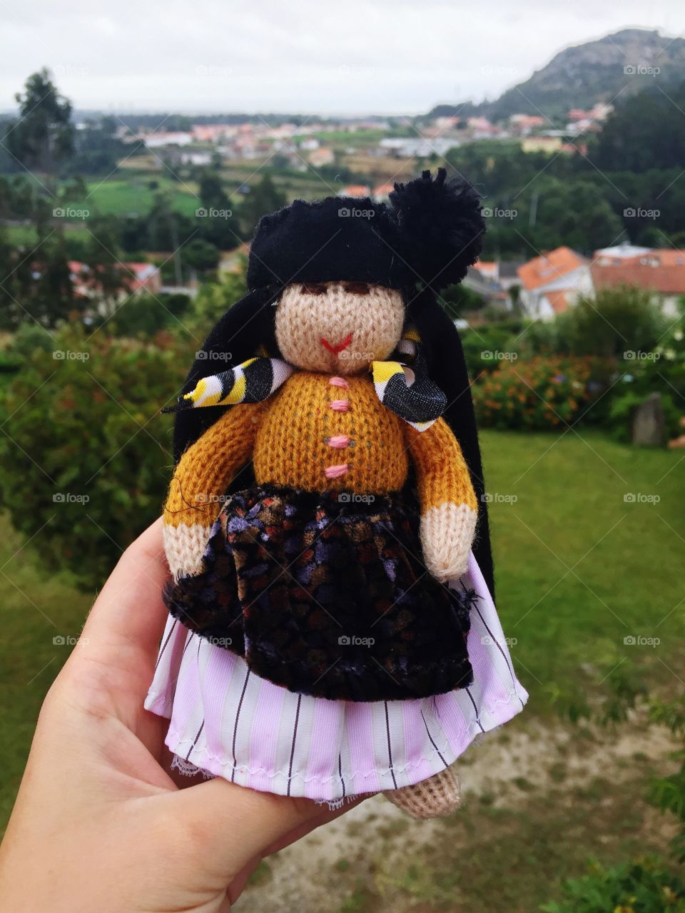 A knitted doll in traditional clothes from Portuguese city Nazaré 