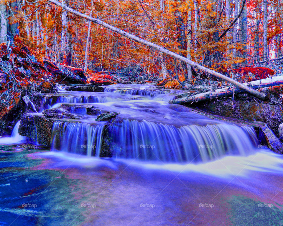 Autumn waterfall in forest