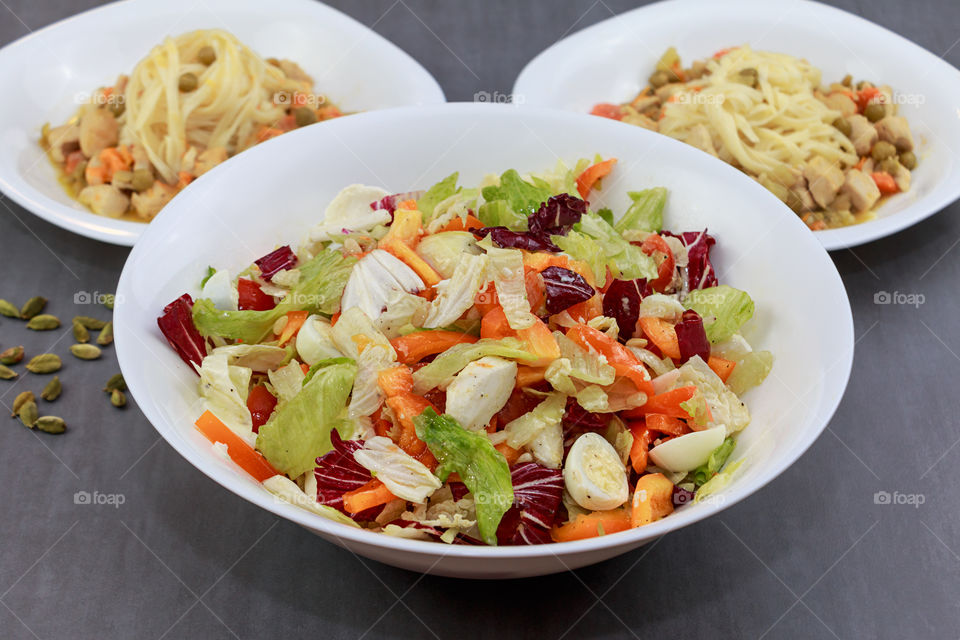 Close-up of greek salad with pasta