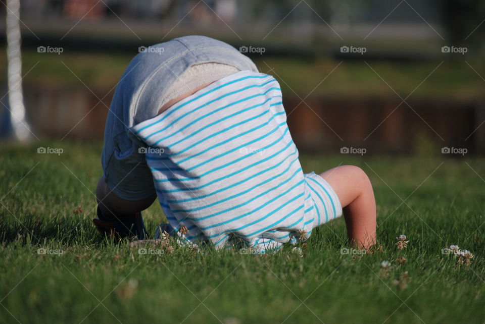 Practising somersault in the park