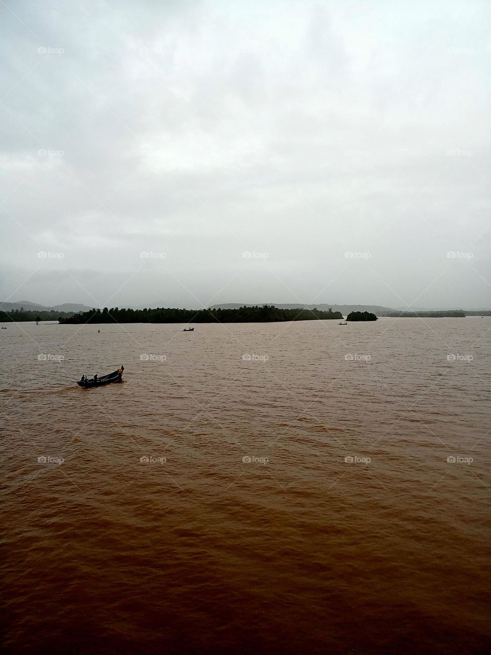 Indian river with small fishing bot