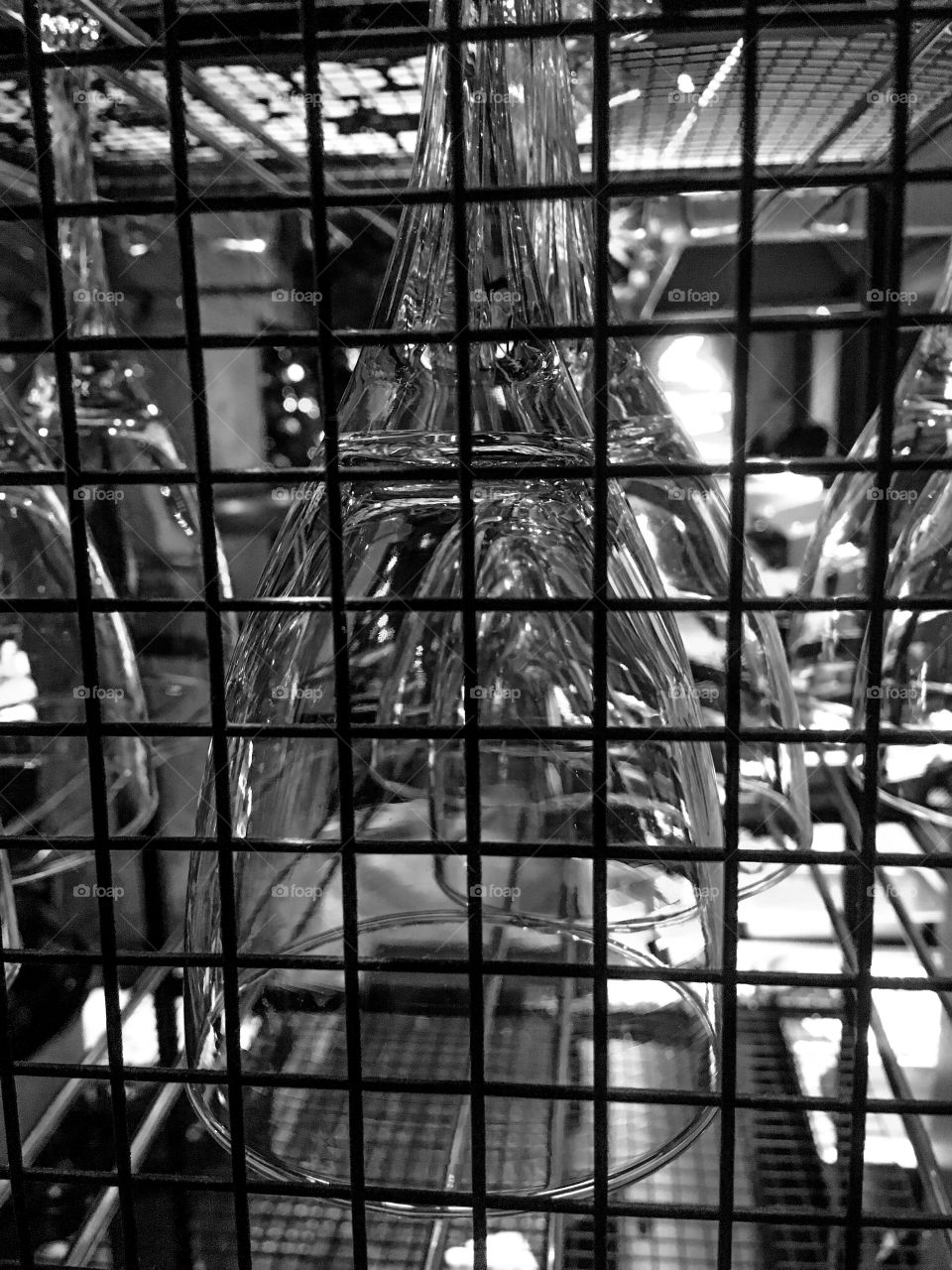 The metal lattice. The glasses. Black and white abstract background. 