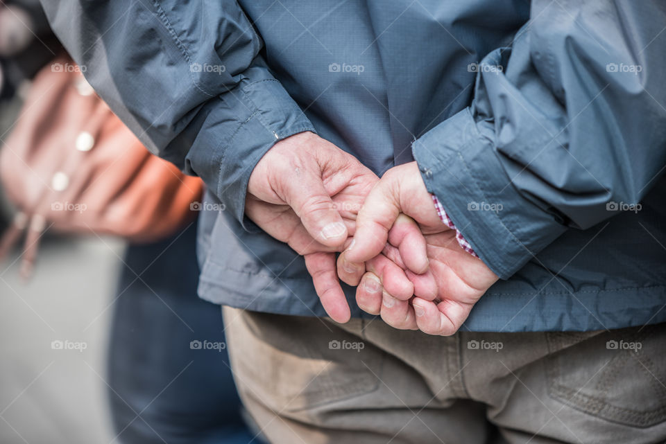 hands of an older man