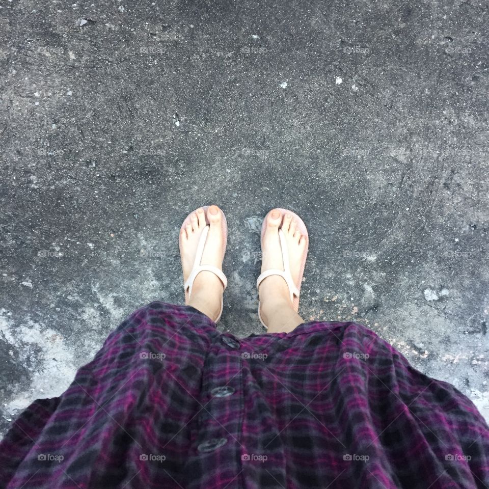 Selfie of woman feet on floor. Selfie of woman feet on floor great for any use.