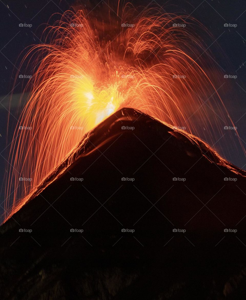 Long exposure of exploding volcano named fuego