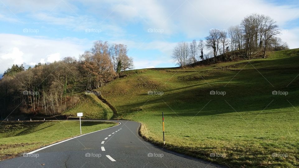 Scenic view of empty road