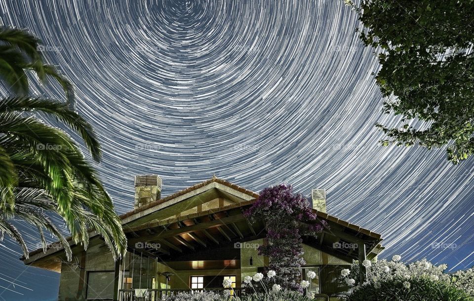 Star trails over the house 