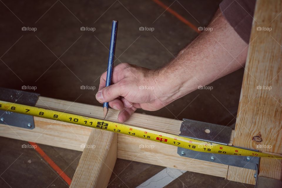 Person working with measuring tape