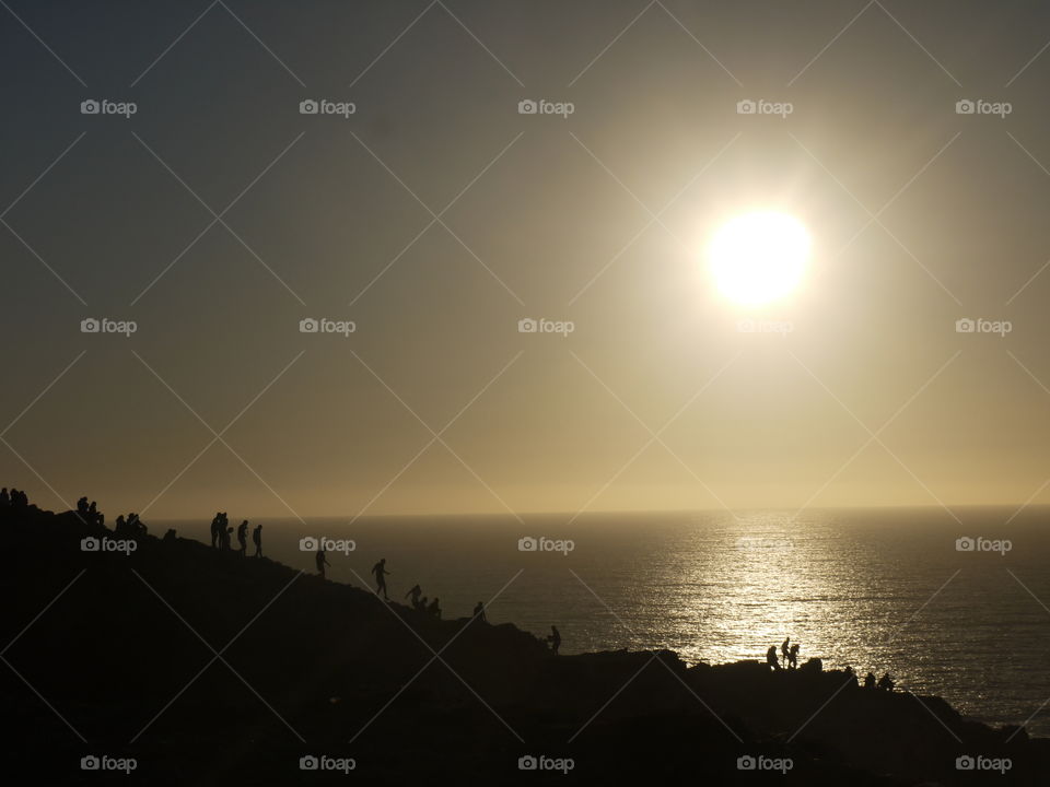 shadows in sunset. the last sunset of continental europe near Sagres