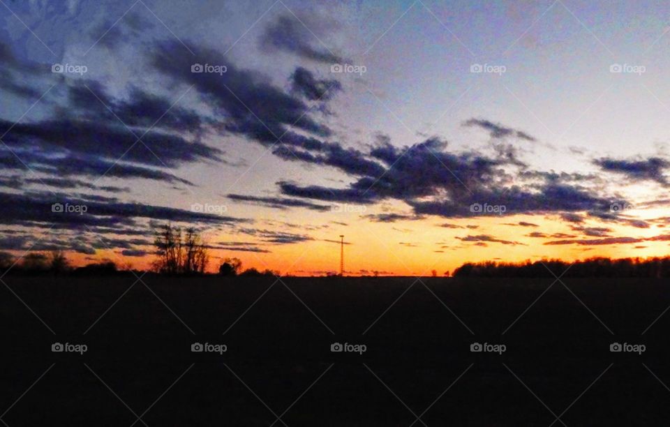 field silhouette with beautiful sunset