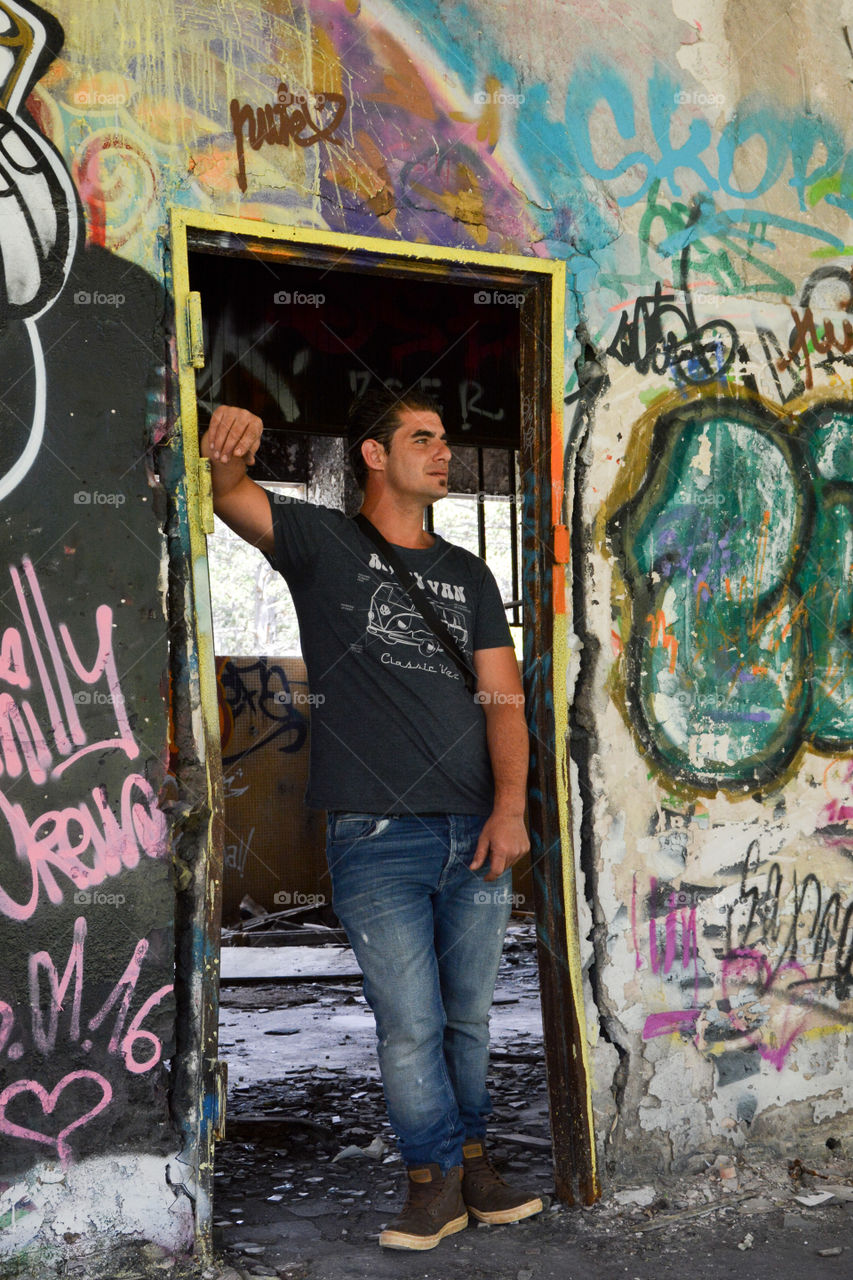 Shooting Man, abandoned building, graffiti 