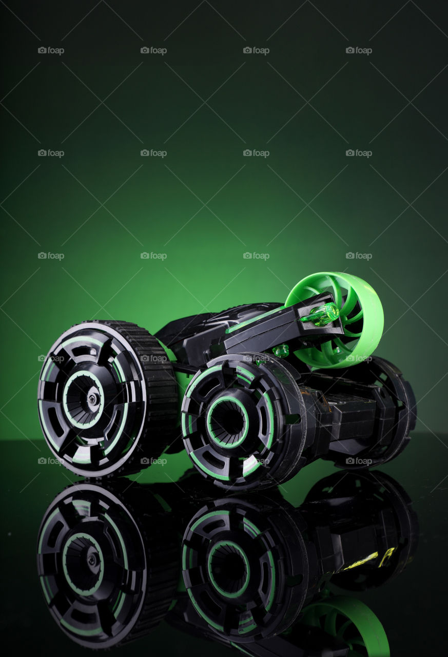 Green black toy stunt car