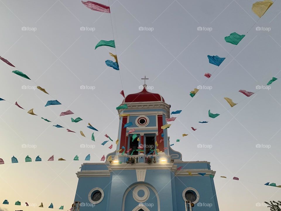 Church with colorful flags during Saint Joseph’ Festivities , São José de Ribamar, Maranhão, Brazil