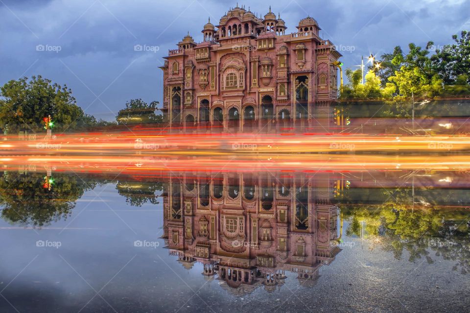 Patrika gate at night with vehicle lights with reflection 