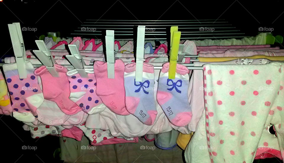 baby socks and clothes drying