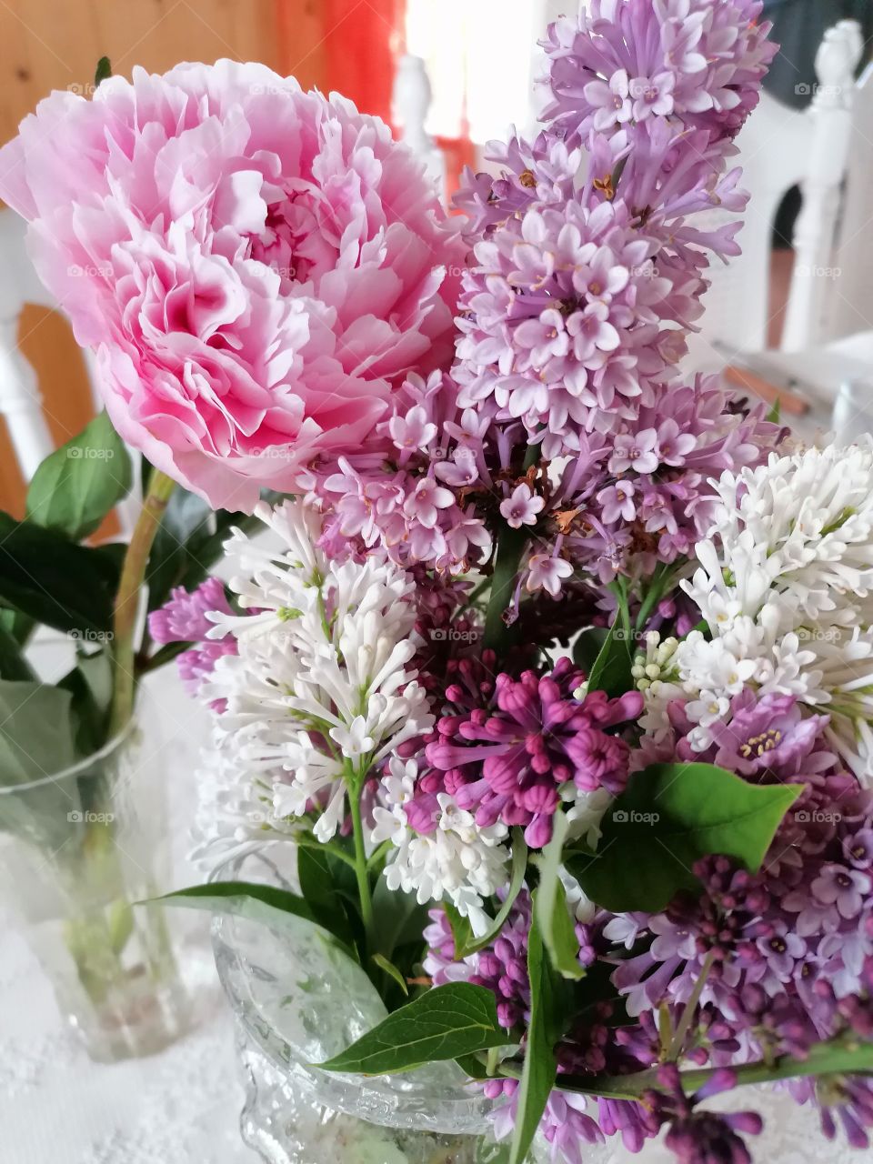 Beautiful bouquet with peony and lilacs. A wonderful summer day in July 2021!