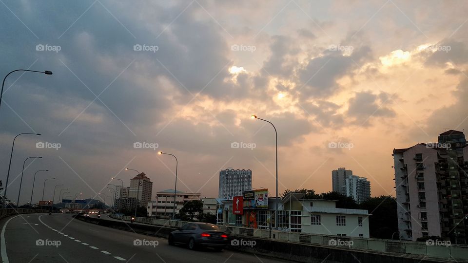 cityscape and dramatic sky